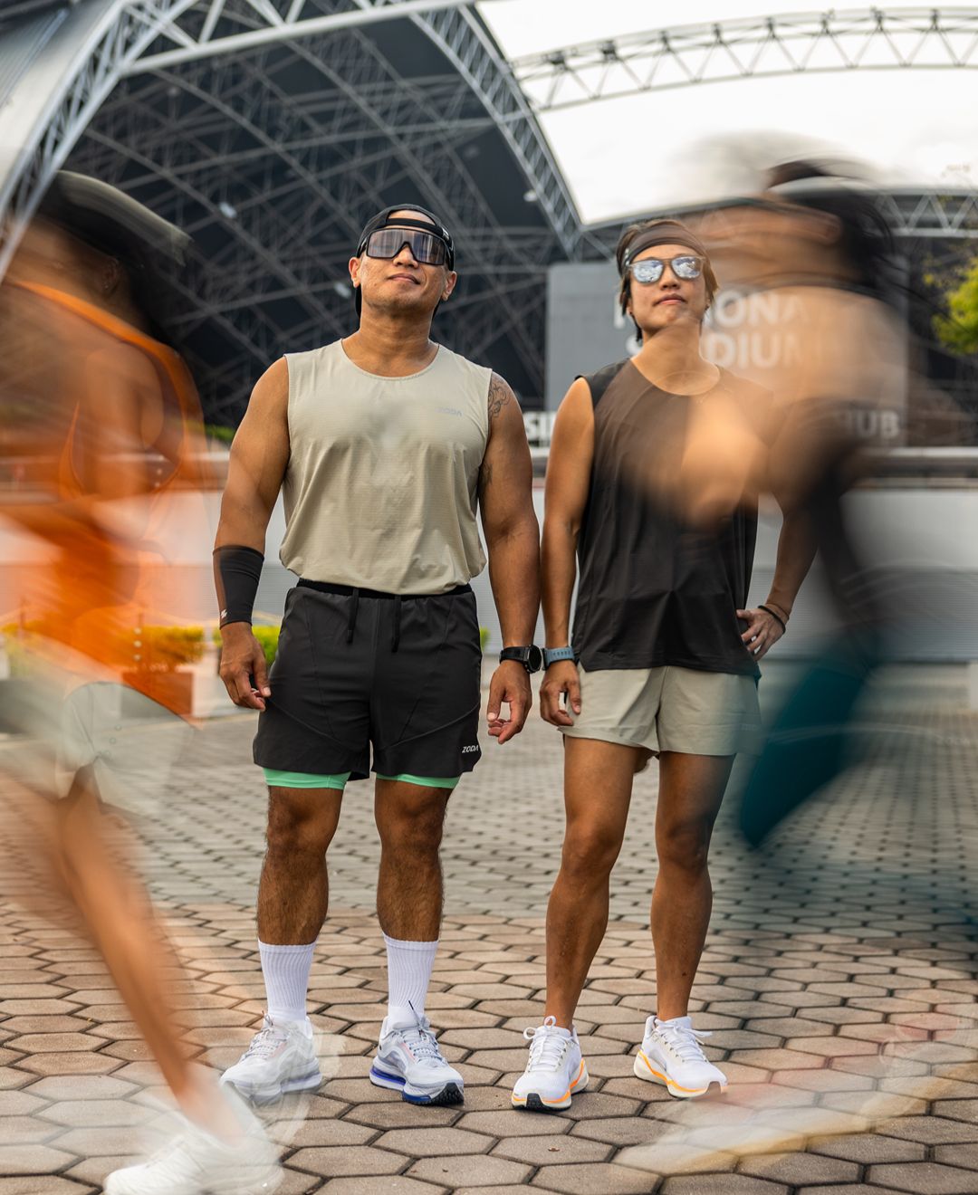 Two people walking on a street with blurred motion effect Zoda.sg pulse collection