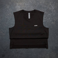 Black sleeveless top with 'Zoda' branding on a gray textured background Zoda.sg