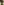 
        Person wearing green athletic shorts with a pocket, black arm sleeve, and beige shirt. Zoda.sg 
      